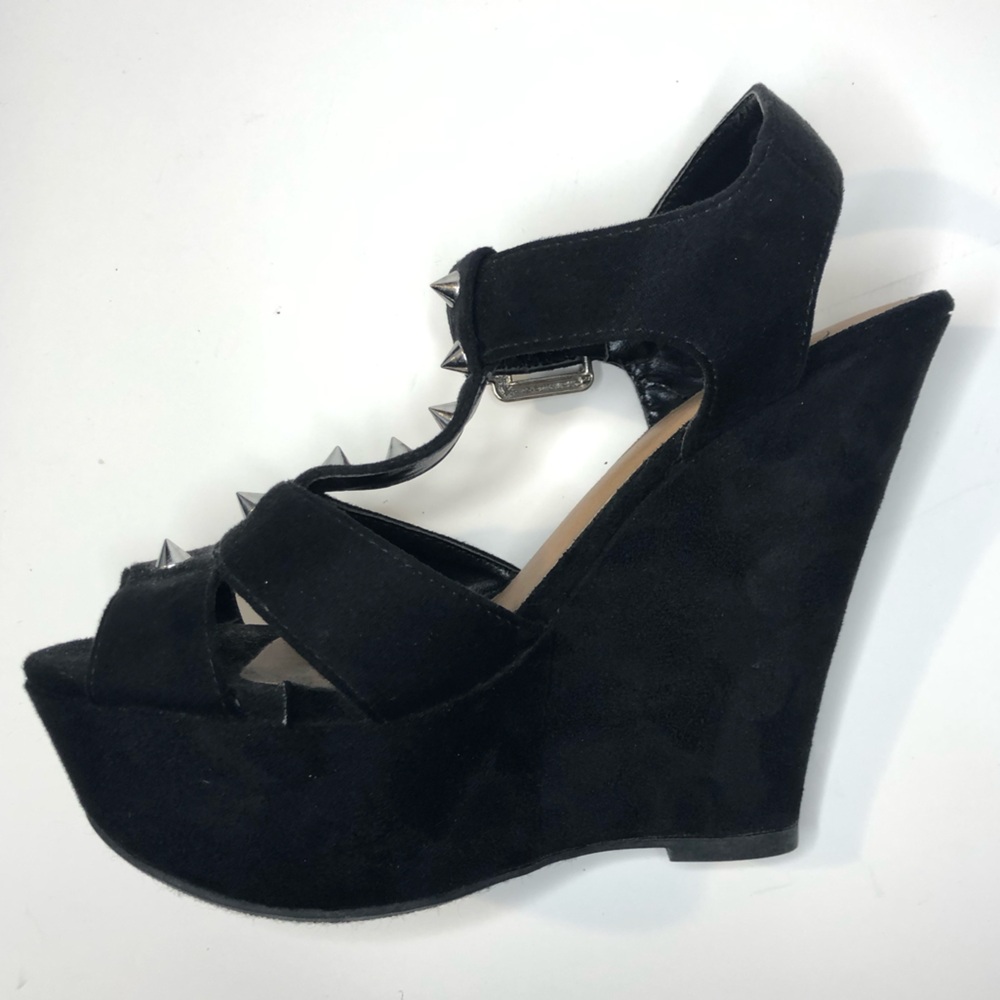 Woman’s black suede wedges with silver spikes size 5.5